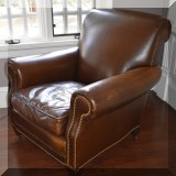 F23. Brunschwig & Fils leather club chair. 36”h x 37”w x 42”d 